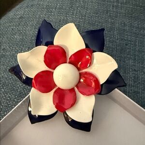 vintage patriotic red, white, and blue enamel flower power brooch pin